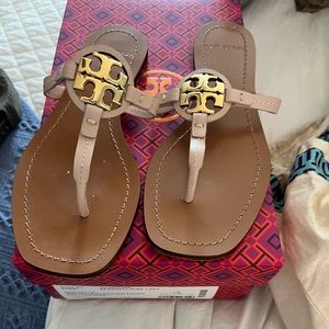 Tory Burch Sandals. Only worn a few times. Too big for my narrow foot.
